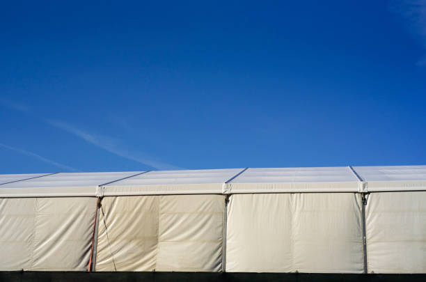 istock White plastic canopy tent outdoors 2170997534