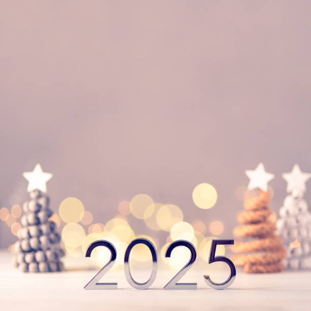 istock Metal numbers 2025 on table with bokeh lights. 2170998298