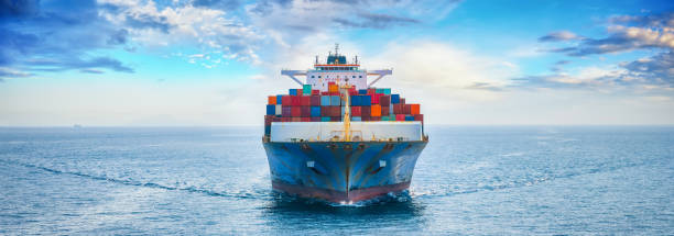 istock Front view of a large container cargo ship sailing over the ocean 2170998489