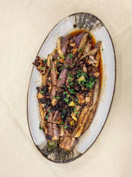 istock Douchi pork belly steamed eggplant on a dinner plate 2171002023