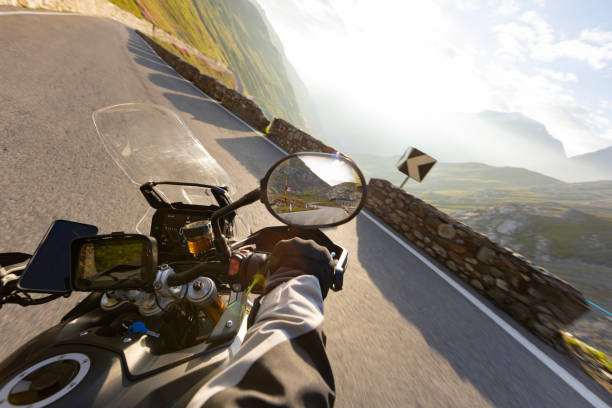 istock Motorbiker riding in Italian Alps 2171002717