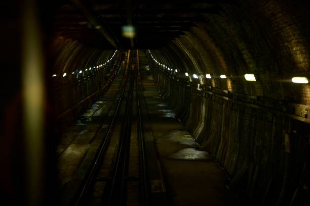 istock Long dark funicular tunnel with lights in Istanbul, Turkey 2171003803