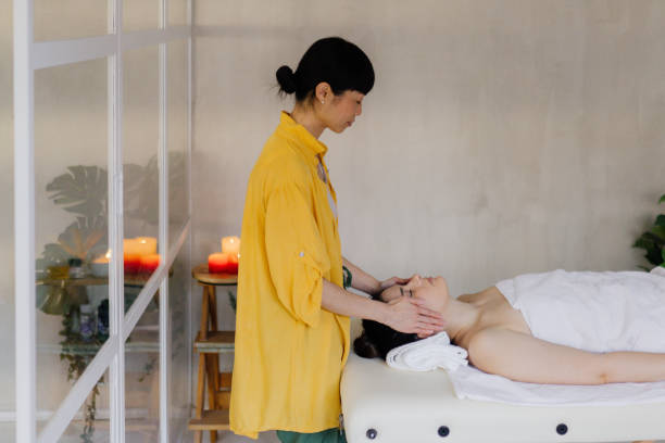 istock An Asian masseuse performing a massage 2171004388