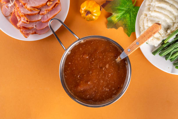 istock Homemade gravy sauce in small pot 2171005675