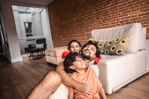 istock Father and kids playing at home 2171011732