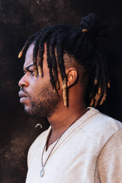 istock Stylish black man with dreadlocks in buns 2171012136