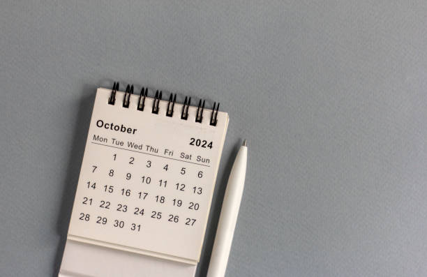 istock Desk calendar for October 2024 on a gray background. 2171013021