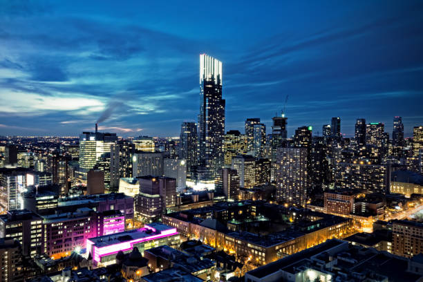 A mesmerizing cityscape captured at dusk, showcasing a blend of modern skyscrapers and city lights.