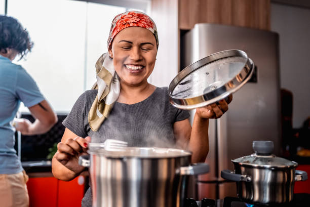 istock Mature woman cooking at home 2171014284