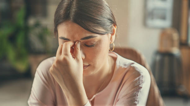 istock Young woman suffering from migraine 2171014773