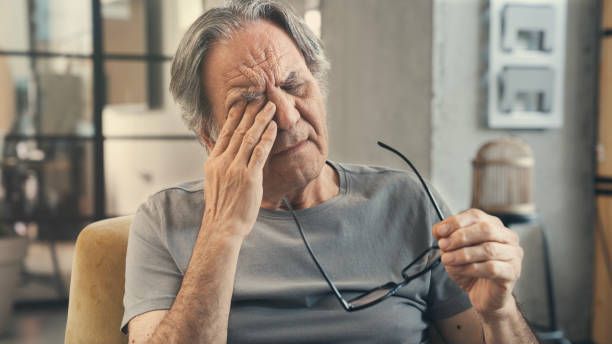 istock Old man with eye fatigue 2171014816
