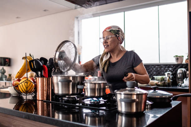 istock Mature woman cooking at home 2171015480