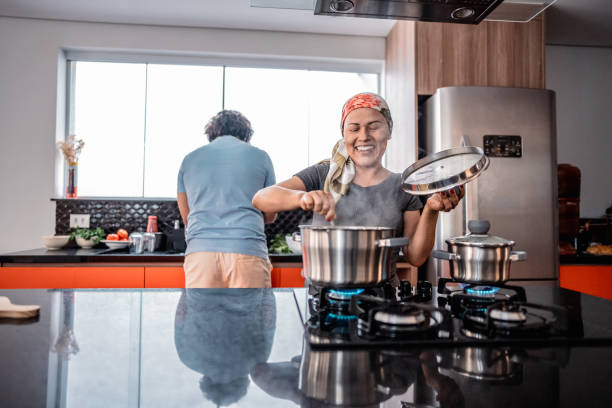istock Mature woman cooking at home 2171015628