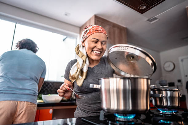 istock Mature woman cooking at home 2171015632