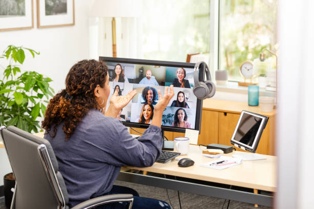 istock Unrecognizable mid adult female gestures while talking to her colleagues 2171016490