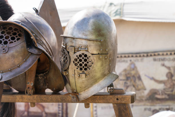 istock Ancient Roman gladiator helmets in a military camp 2171020848