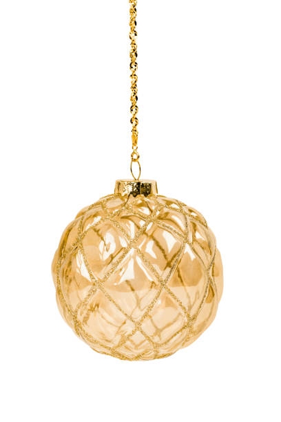 A shiny golden Christmas ornament featuring an elegant quilted pattern, hanging from a delicate gold chain, perfect for festive holiday décor