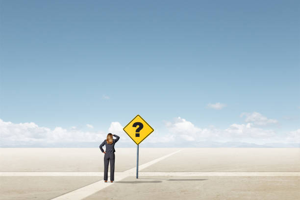 istock Woman Looks Down Disappearing Path 2171026657