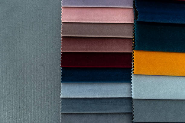 istock upholstery fabric samples on grey sofa, concept of renovation 2171029725