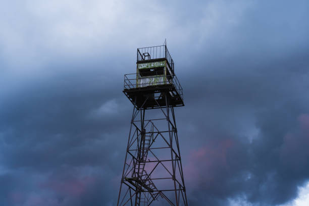 Aviation military radar in top of tower against the blue sky