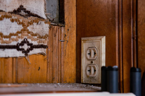 An old electrical outlet in the basement of an old house. Shot in Oregon, USA.
