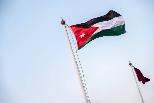 Jordan flag with clear blue sky in the background