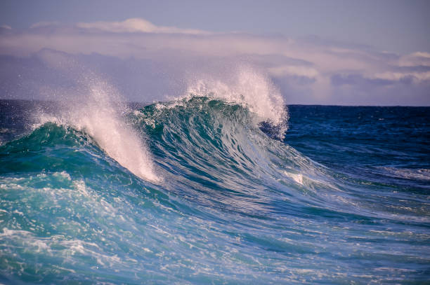 istock A wave is crashing into the ocean, creating a beautiful and powerful scene 2171041141