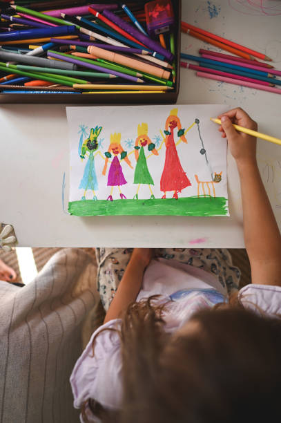 istock Child drawing friendship on paper. 2171042009
