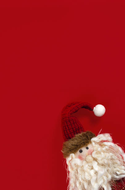 istock Christmas dolls on red background with copy space on red background. 2171042964