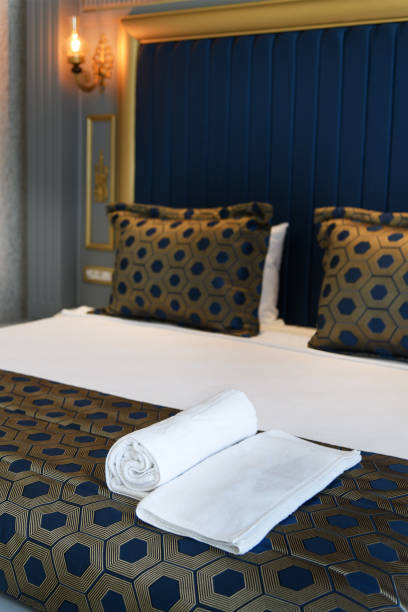 istock Hotel Room Bed with Stylish Cushions 2171047389