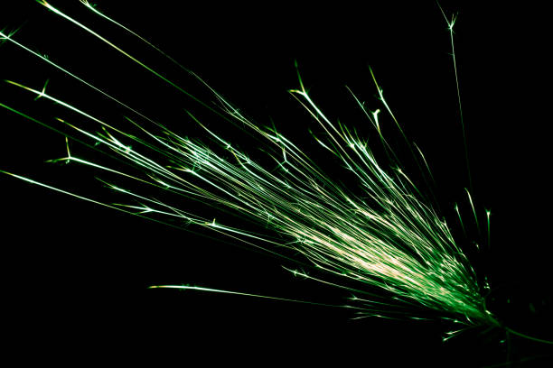 istock green sparks from the grinder glowing in the dark 2171048096