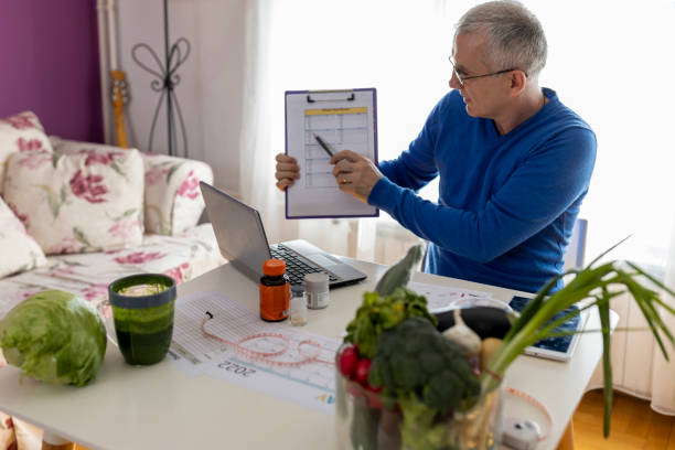 istock Nutritionist doing videocall with computer to doing a patient consultation in the nutritionist consultation 2171052389