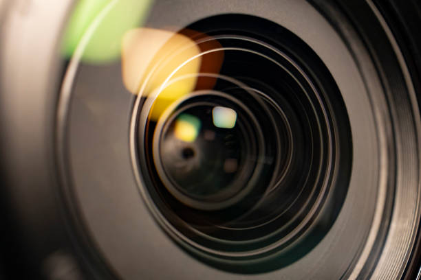 istock Lights reflecting in the camera lens glass. 2171053819