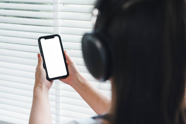 istock Person holding smartphone with blank screen. 2171059264