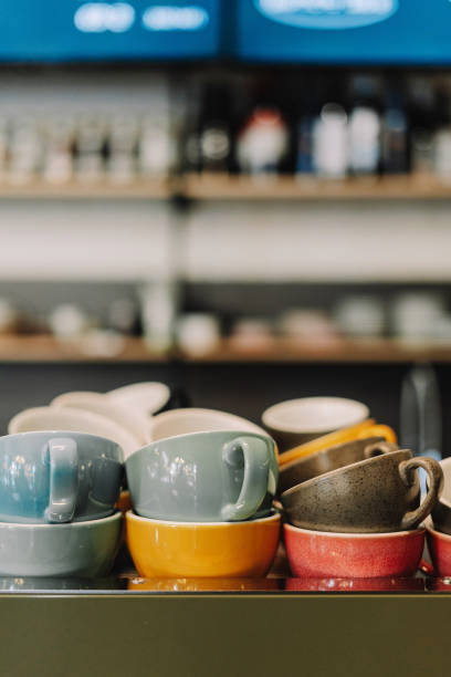 istock Many empty ceramic coffee cups sitting on counter in cafe 2171063664
