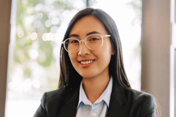 istock Young asian businesswoman smiling while working in office 2171065027