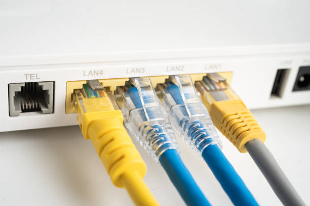 istock Ethernet cable with wireless router connect to internet service provider internet network. 2171073940