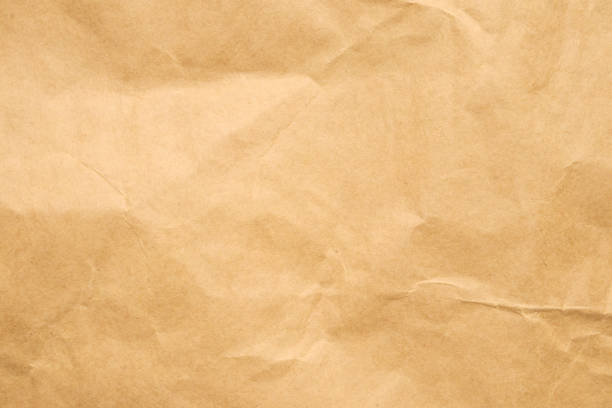 istock Abstract crumpled and creased recycle brown paper texture background 2171075843