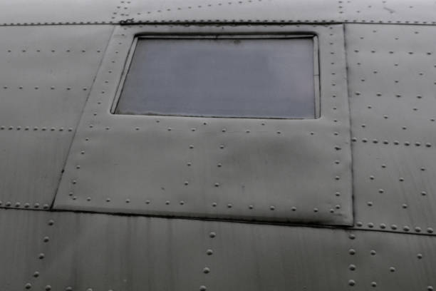 istock The surface of an old airplane fuselage. 2171076353