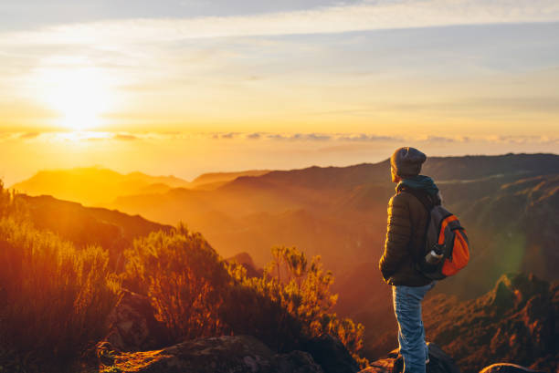istock Hiker greeting the sun on Madeira island. 2171077186