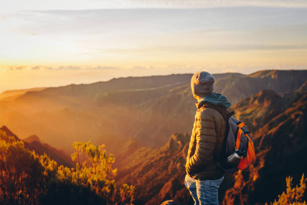 istock Hiker greeting the sun on Madeira island. 2171077194