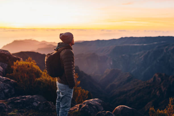 istock Hiker greeting the sun on Madeira island. 2171077214