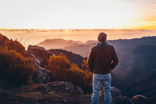 istock Hiker greeting the sun on Madeira island. 2171077216