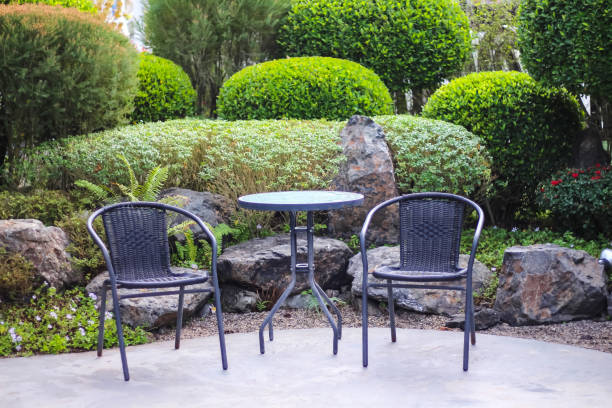 istock Table and blank chairs in garden outdoor background 2171077477