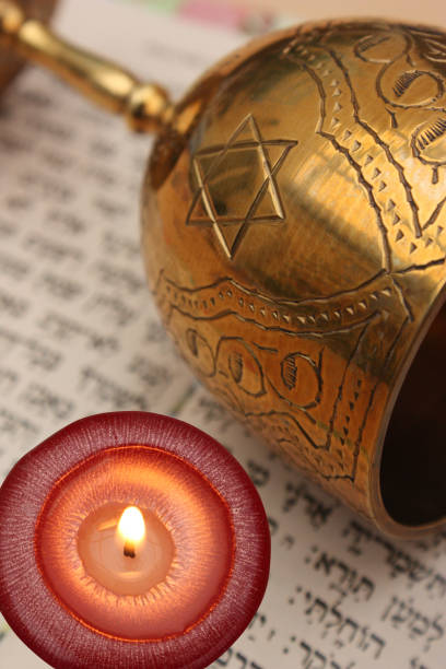 istock Judaism  Prayer  Hebrew  Candle lit 2171084542
