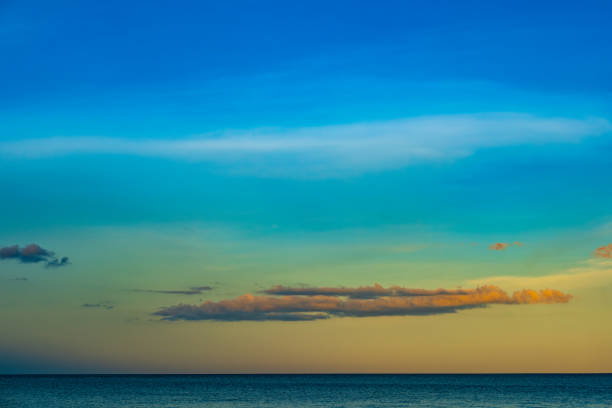 Skyline scenery Sunset in the evening sky with colorful clouds and beautiful cloud patterns In the soft light evening at the sea