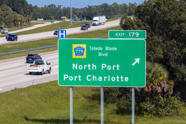 istock Interstate freeway exit sign in Florida, USA. I-75 highway interchange with direction to North Port and Port Charlotte 2171084956