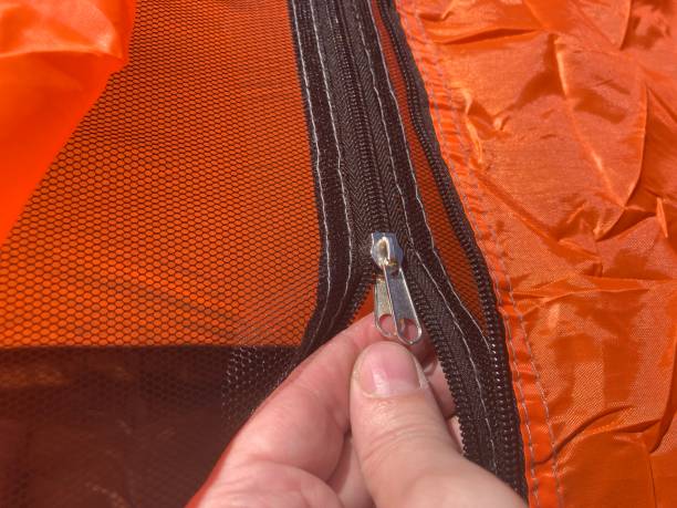 istock Setting up a tourist tent for hiking 2171087523