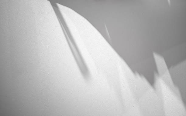 istock White wall background. fabric or curtain soft shadows. 2171092442