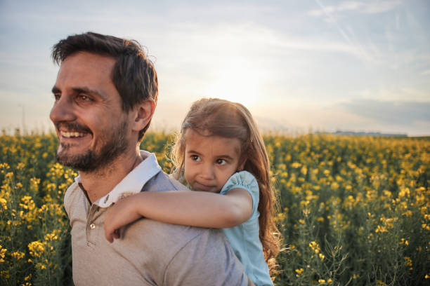 istock Father and daughter enjoying nature 2171094235